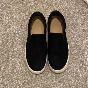Black platform slip-ons
